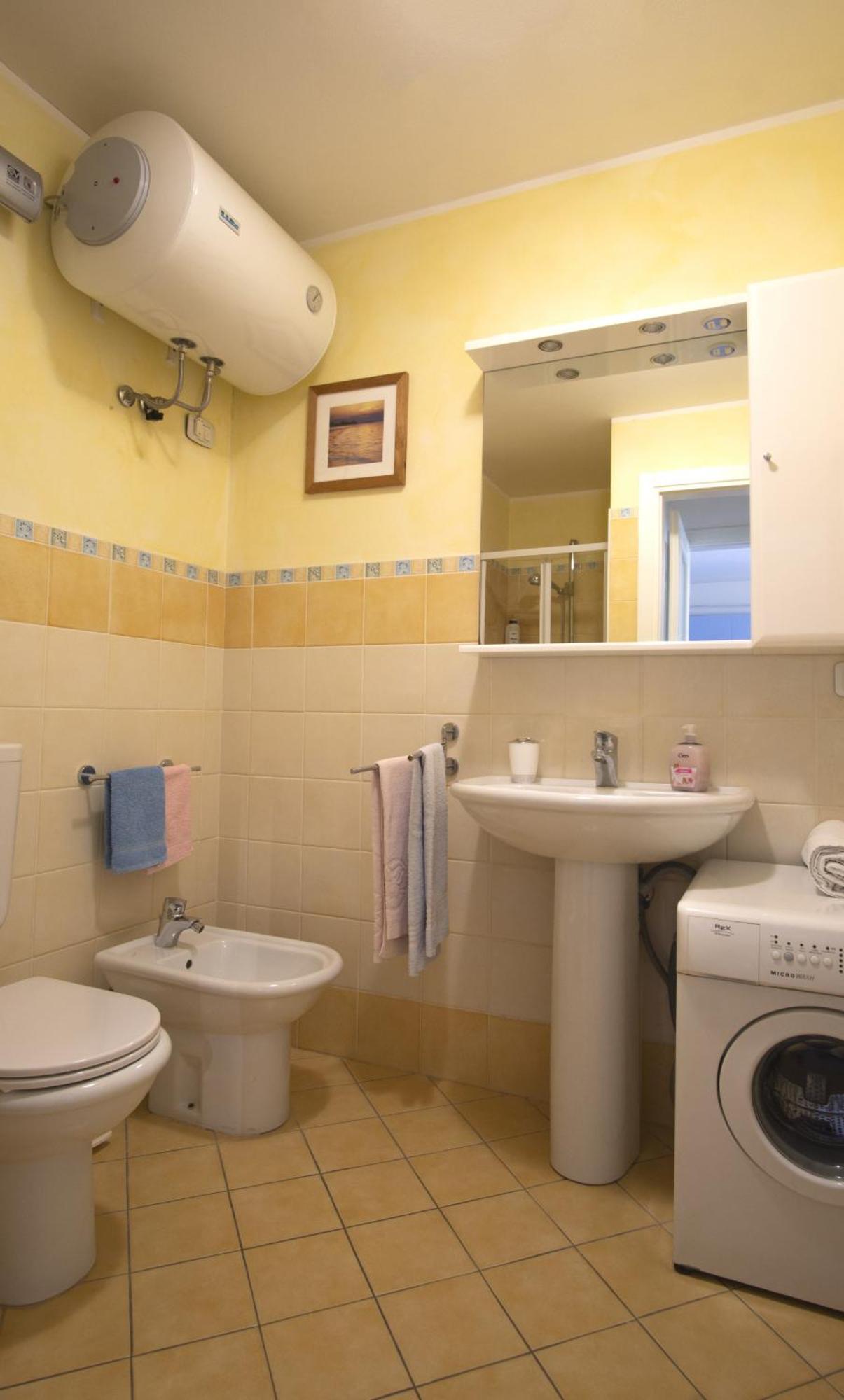 Gaia Apartment Un Gioiello Градо Экстерьер фото